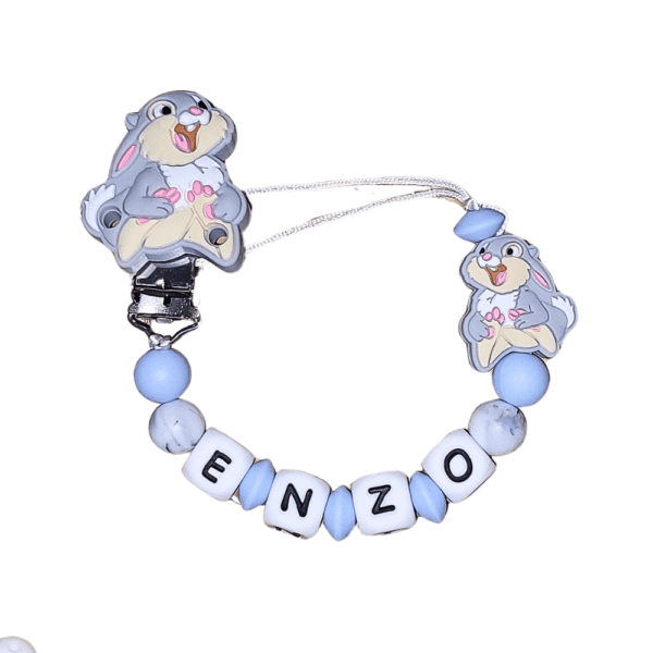 chupetero silicona tambor disney fondo transparente nombre bebe
