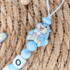detalle chupetero silicona tambor disney gris
