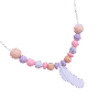 collar-denticion-silicona-pluma-colores-pastel-rosa-lavanda-fondo-trasnparente