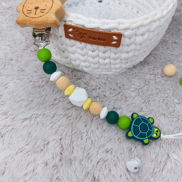 sujetachupetes-leon-tortuga-verde-silicona-natural